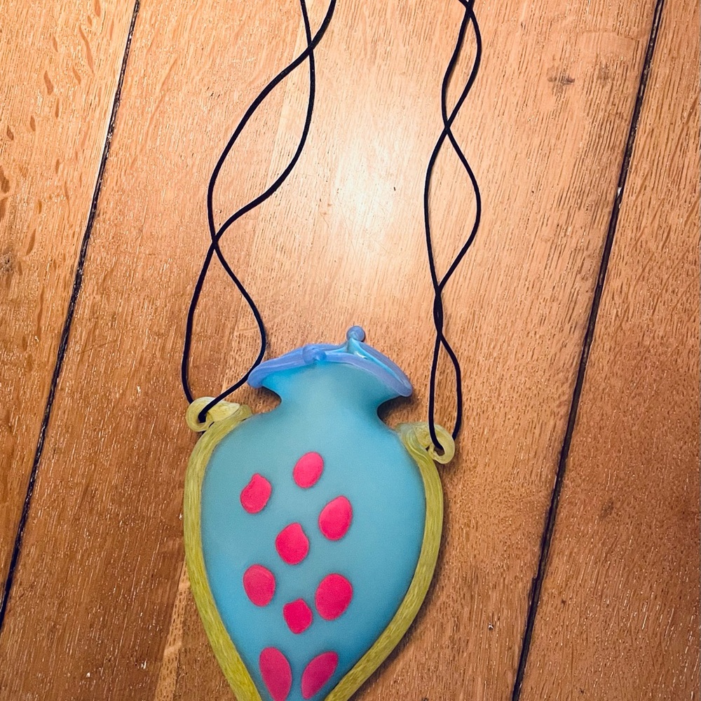Frosted colored glass hanging vase with satin cord